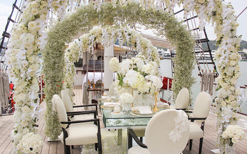 beautiful wedding arrangement in white theme onboard royal albatross