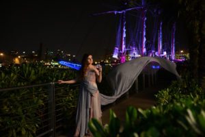 woman in long dress having wine royal albatross