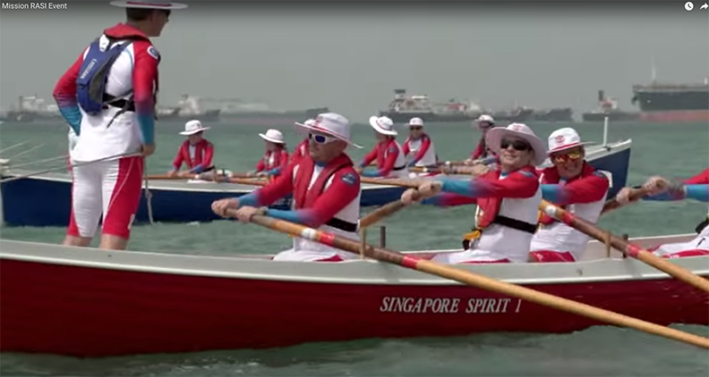 group of people paddling and smiling royal albatross